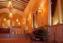 Organ console and lobby with audience